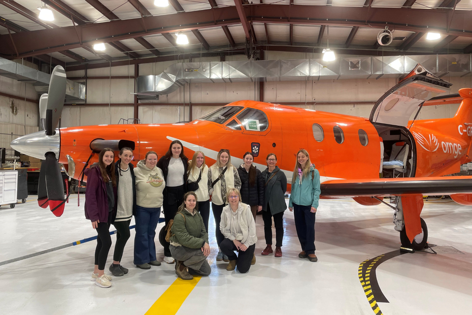 nursing students with plane